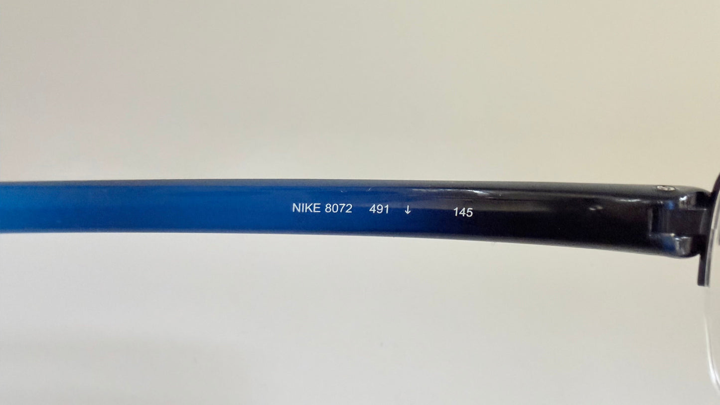 Vintage Nike 00s eyeglasses - Y2K rimless frame with black and blue temple