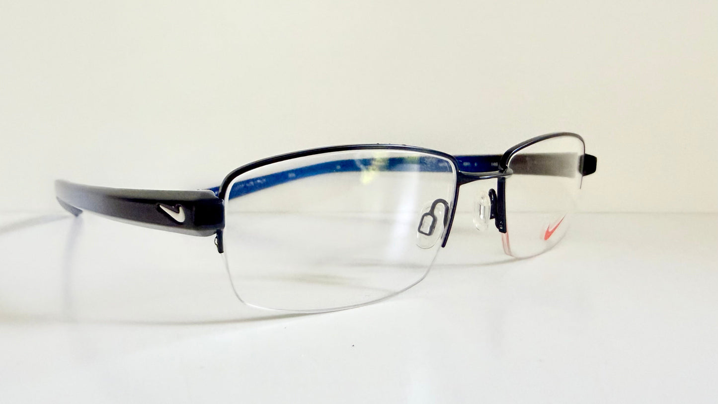 Vintage Nike 00s eyeglasses - Y2K rimless frame with black and blue temple