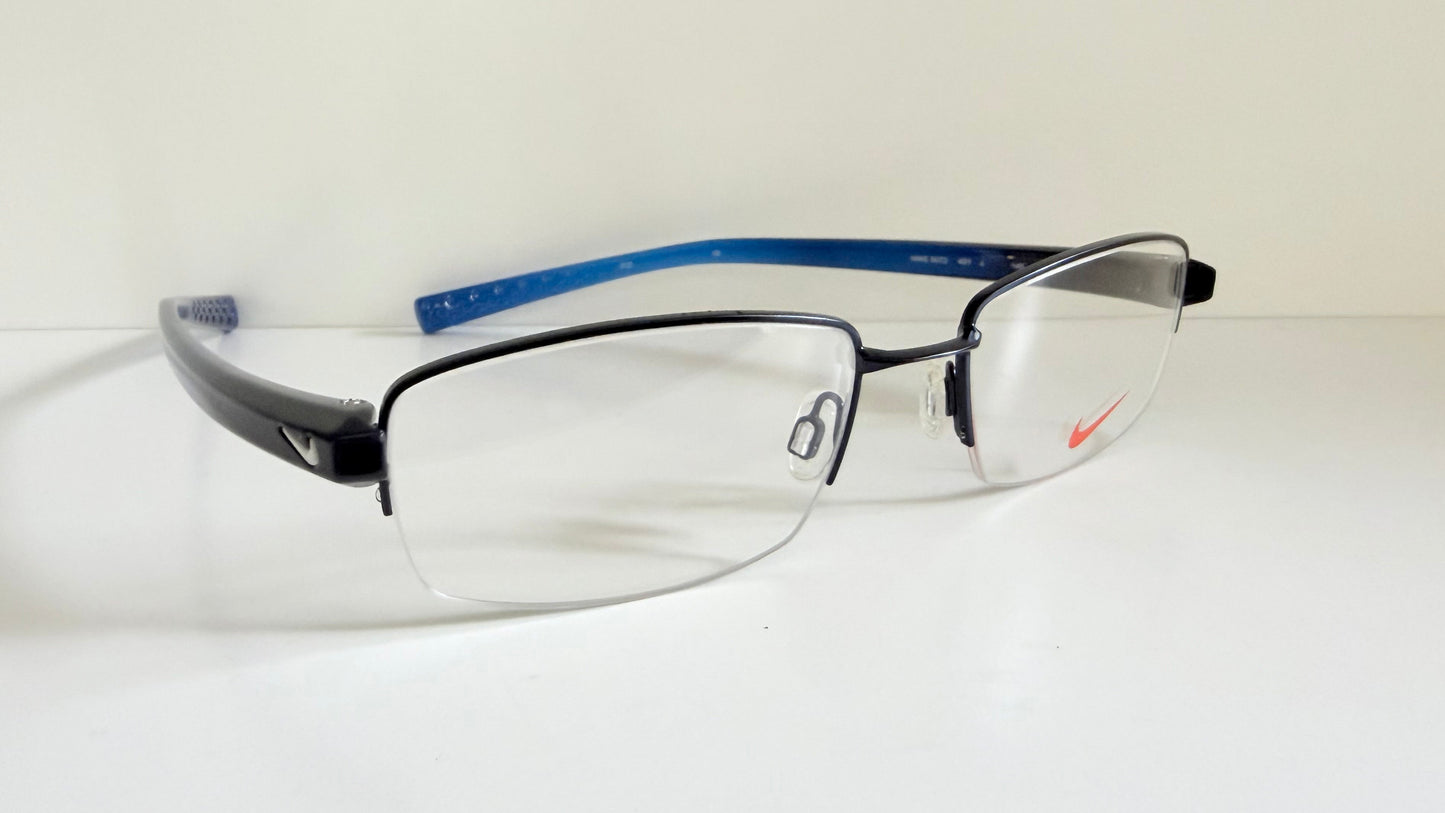 Vintage Nike 00s eyeglasses - Y2K rimless frame with black and blue temple