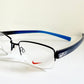 Vintage Nike 00s eyeglasses - Y2K rimless frame with black and blue temple