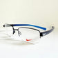 Vintage Nike 00s eyeglasses - Y2K rimless frame with black and blue temple