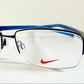 Vintage Nike 00s eyeglasses - Y2K rimless frame with black and blue temple