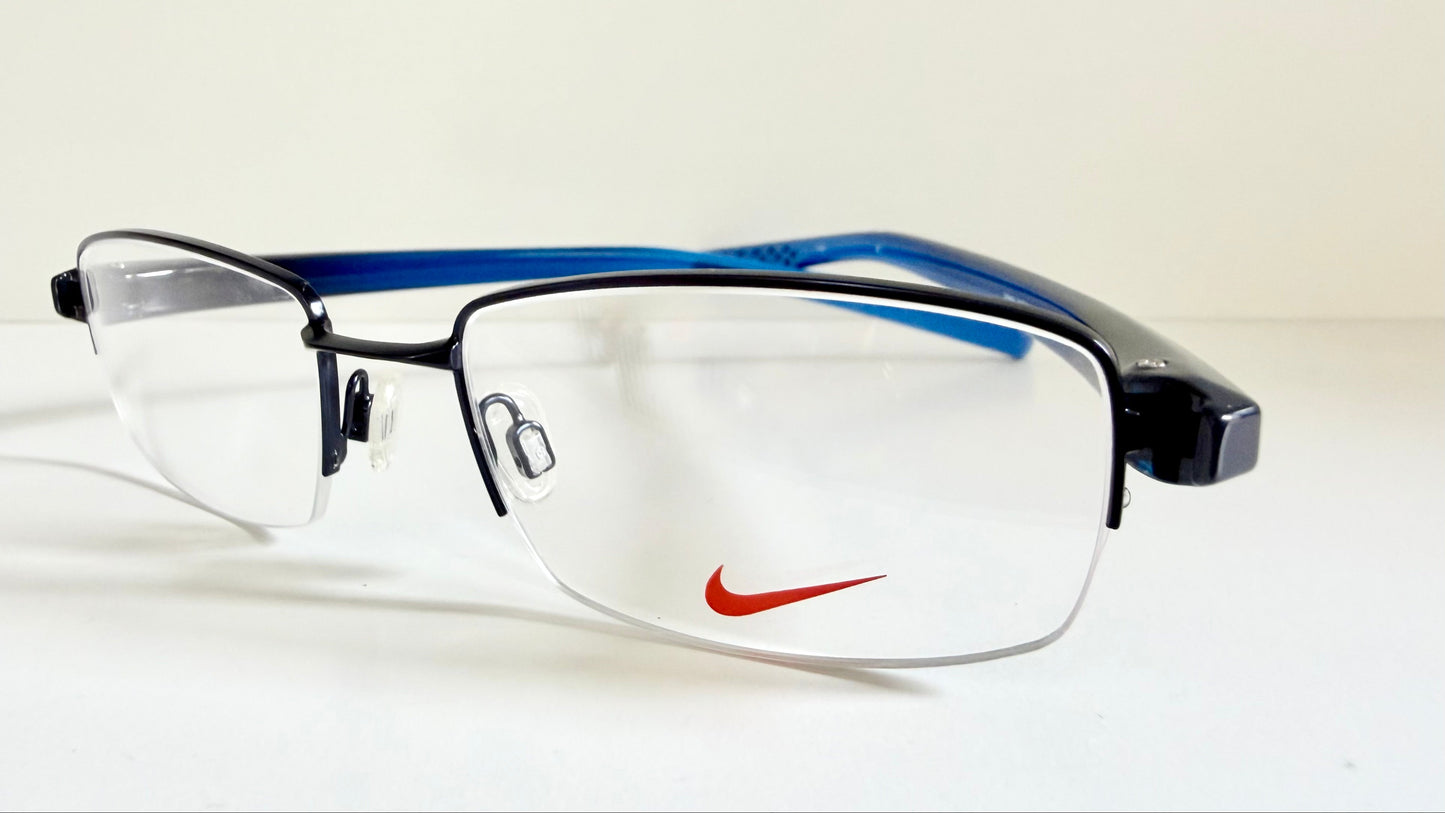 Vintage Nike 00s eyeglasses - Y2K rimless frame with black and blue temple