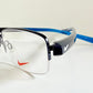 Vintage Nike 00s eyeglasses - Y2K rimless frame with black and blue temple