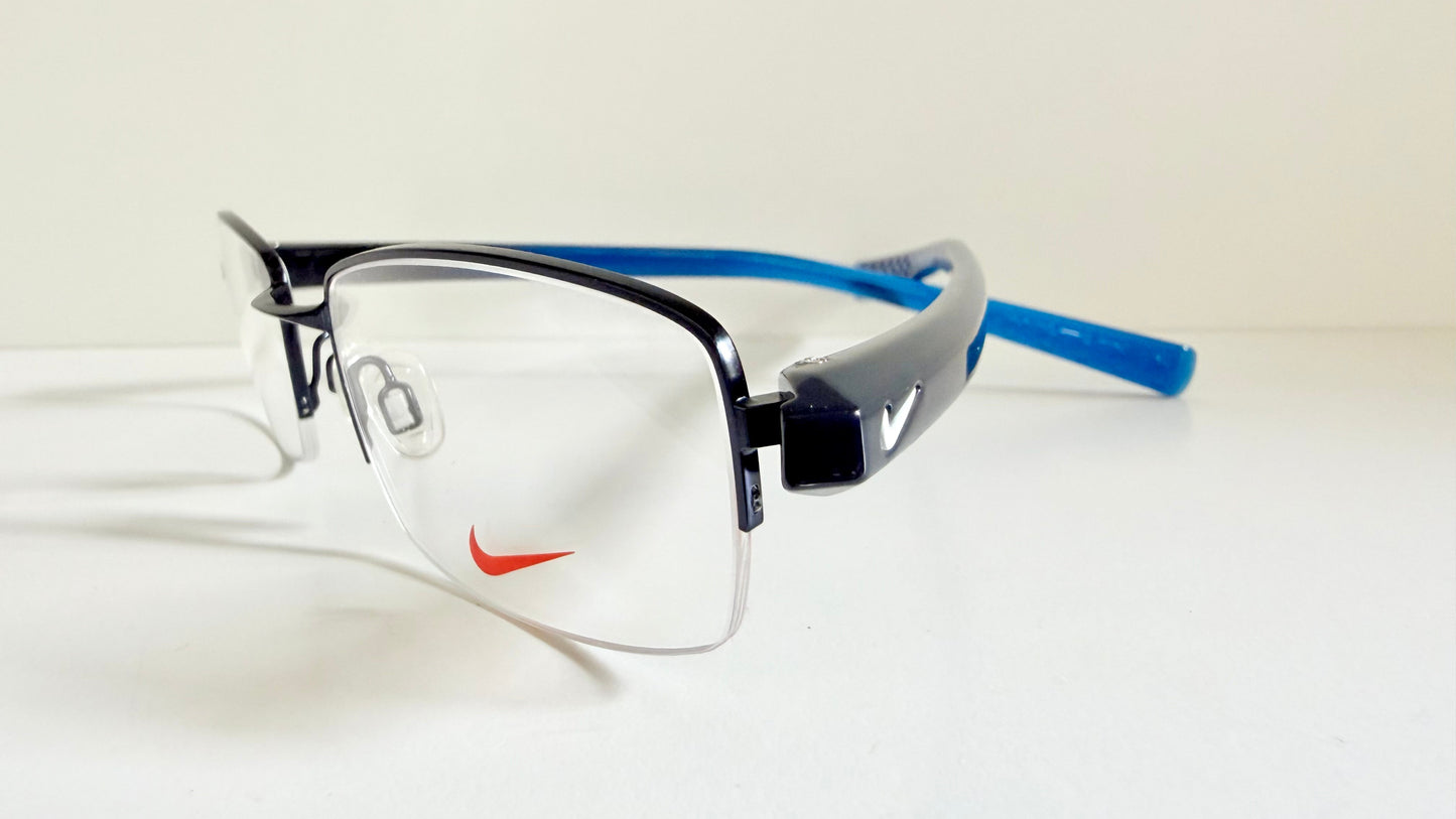 Vintage Nike 00s eyeglasses - Y2K rimless frame with black and blue temple
