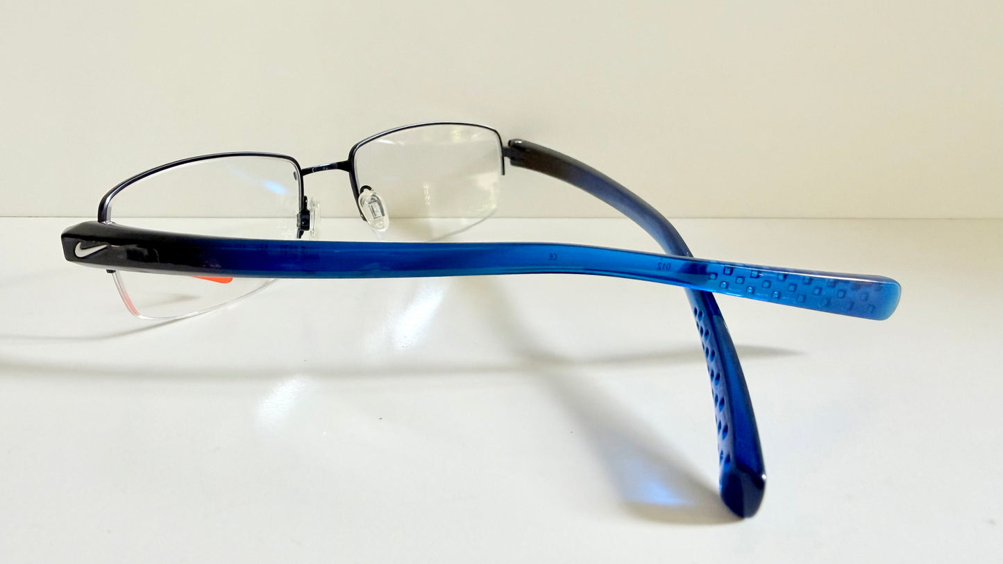 Vintage Nike 00s eyeglasses - Y2K rimless frame with black and blue temple