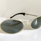 Ray Ban Orbs W2390 clear and silver sunglasses on a white background
