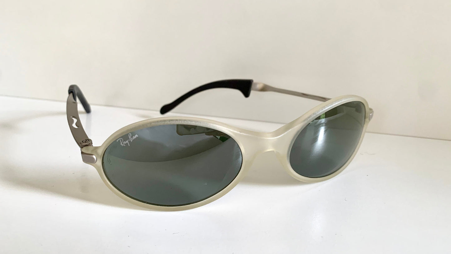 Ray Ban Orbs W2390 clear and silver sunglasses on a white background