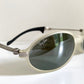 Ray Ban Orbs W2390 clear and silver sunglasses on a white background