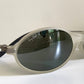 Ray Ban Orbs W2390 clear and silver sunglasses on a white background