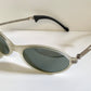 Ray Ban Orbs W2390 clear and silver sunglasses on a white background