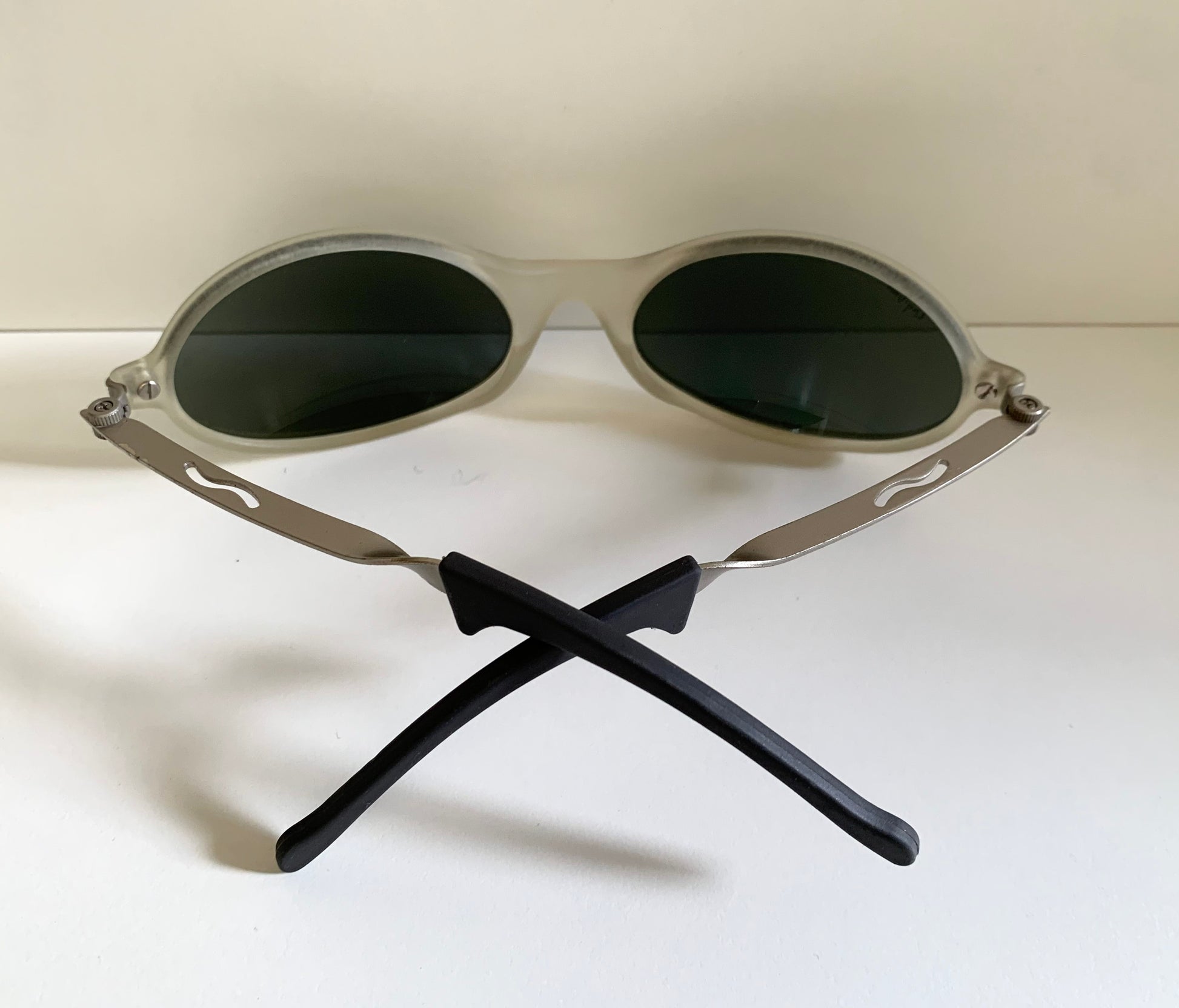 Ray Ban Orbs W2390 clear and silver sunglasses on a white background