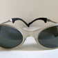 Ray Ban Orbs W2390 clear and silver sunglasses on a white background