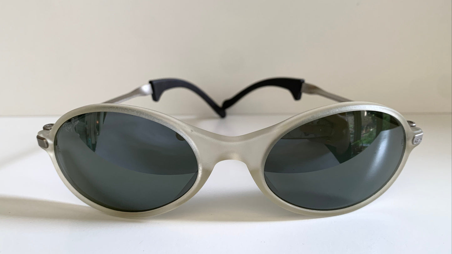 Ray Ban Orbs W2390 clear and silver sunglasses on a white background
