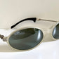 Ray Ban Orbs W2390 clear and silver sunglasses on a white background