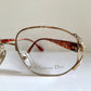 Christian Dior eyeglasses on a white background