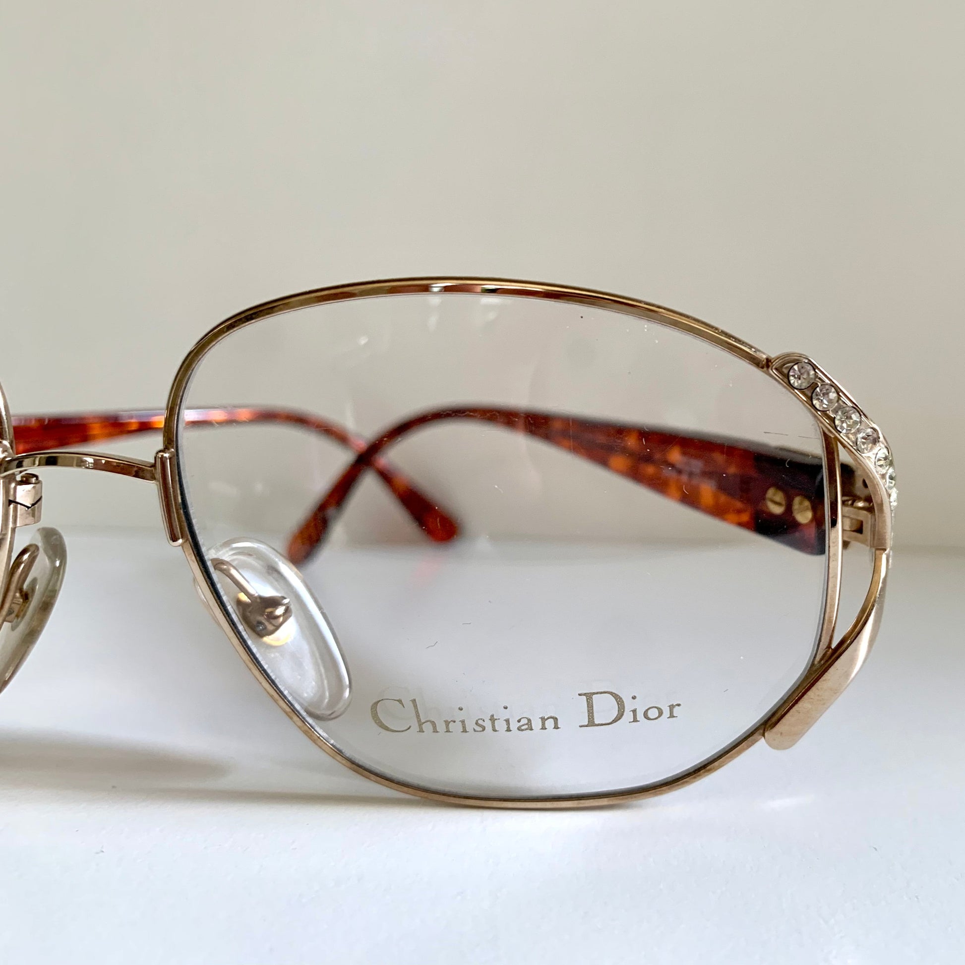 Christian Dior eyeglasses on a white background