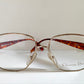 Christian Dior eyeglasses on a white background
