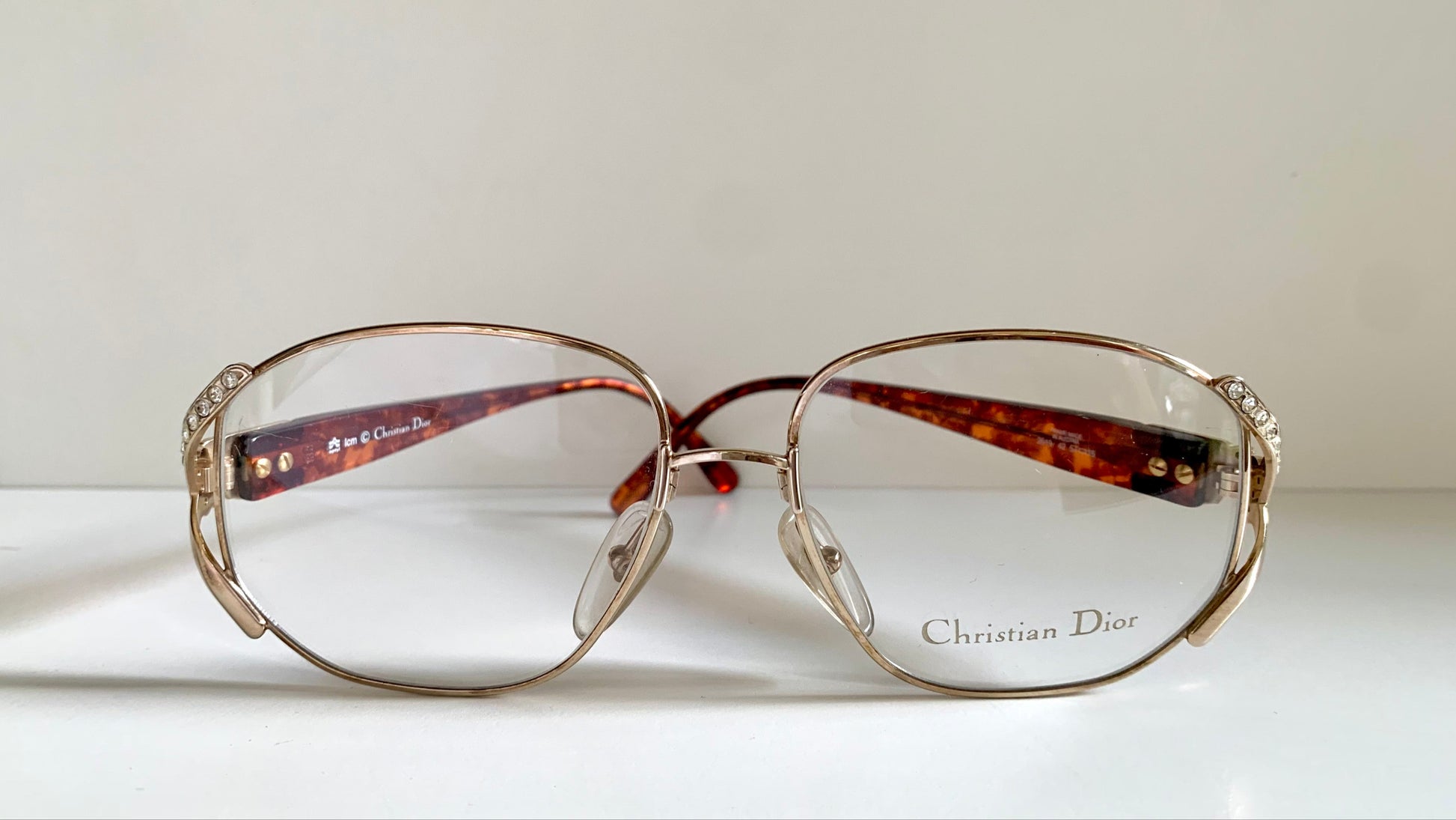 Christian Dior eyeglasses on a white background