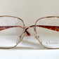 Christian Dior eyeglasses on a white background