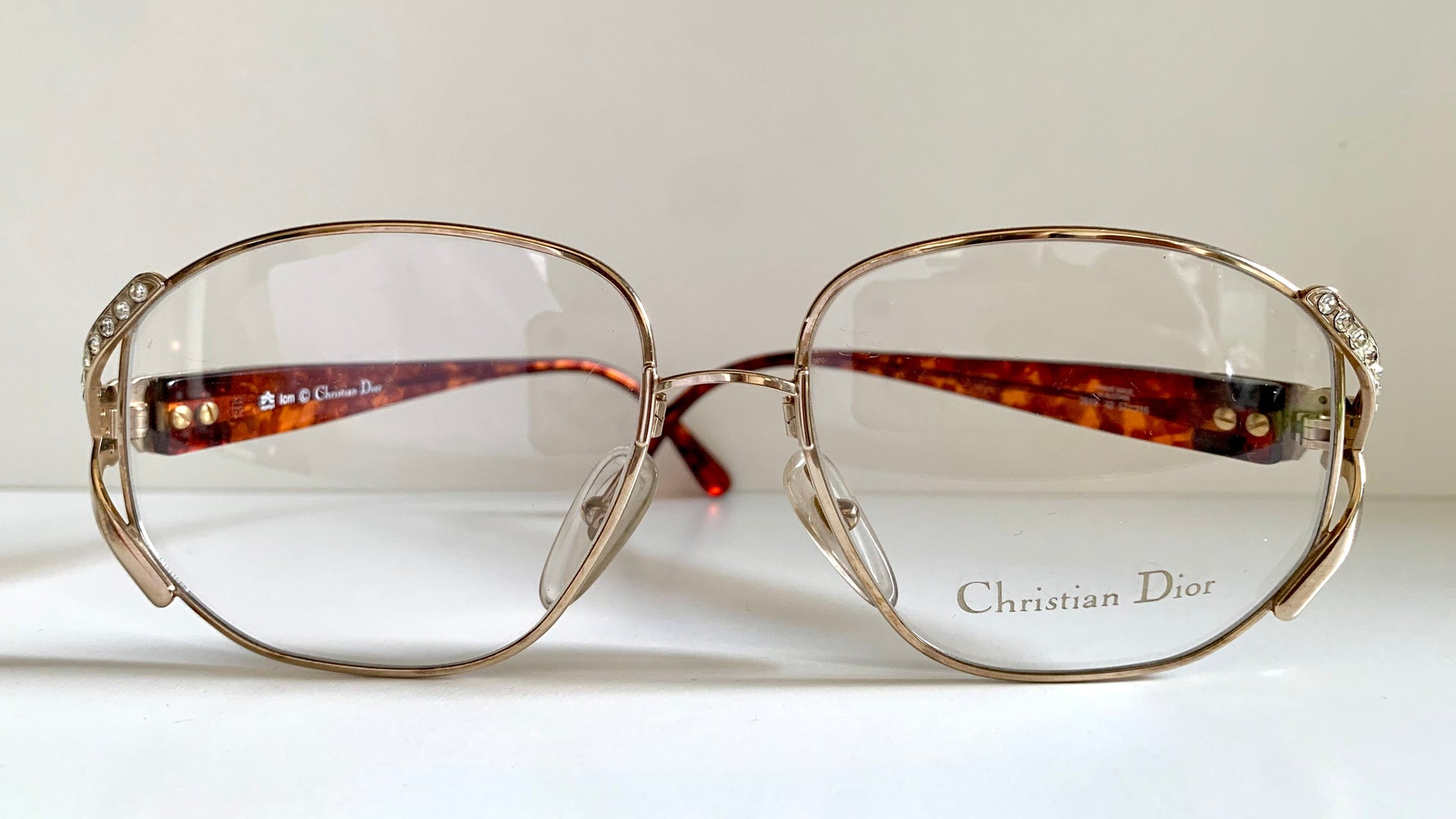 Christian Dior eyeglasses on a white background