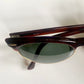 Pair of sunglasses with a 'Ray-Ban' logo on a white background
