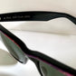 Ray Ban Sreet neat sunglasses with pink mosaice frame on a white surface