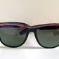 Ray Ban Sreet neat sunglasses with pink mosaice frame on a white surface