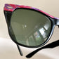 Ray Ban Sreet neat sunglasses with pink mosaice frame on a white surface