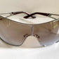 Christian Dior Diorissimo shield sunglasses on a white background