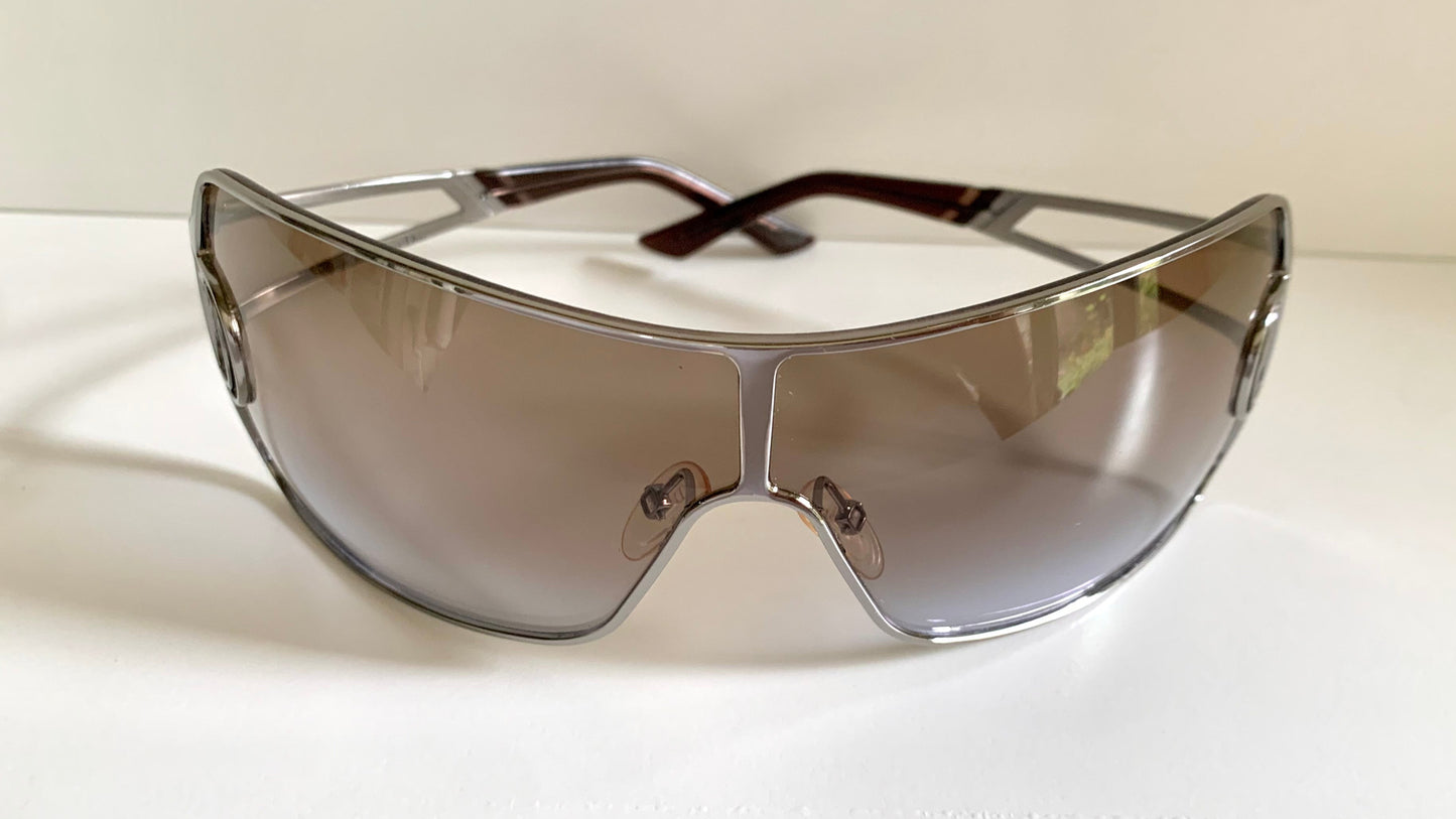 Christian Dior Diorissimo shield sunglasses on a white background