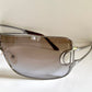 Christian Dior Diorissimo shield sunglasses on a white background