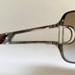 Christian Dior Diorissimo shield sunglasses on a white background