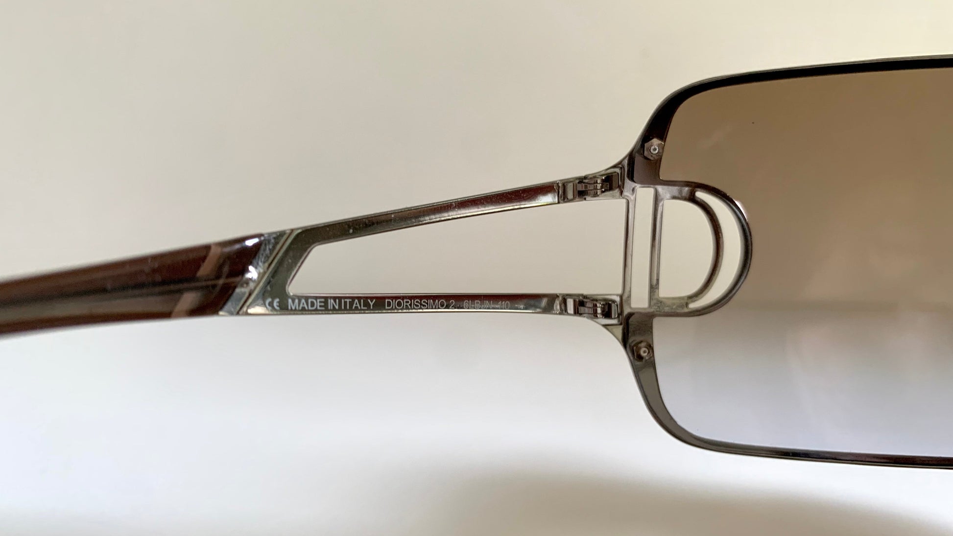 Christian Dior Diorissimo shield sunglasses on a white background