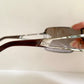Christian Dior Diorissimo shield sunglasses on a white background