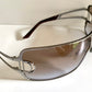 Christian Dior Diorissimo shield sunglasses on a white background
