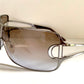 Christian Dior Diorissimo shield sunglasses on a white background