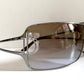 Christian Dior Diorissimo shield sunglasses on a white background