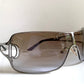 Christian Dior Diorissimo shield sunglasses on a white background