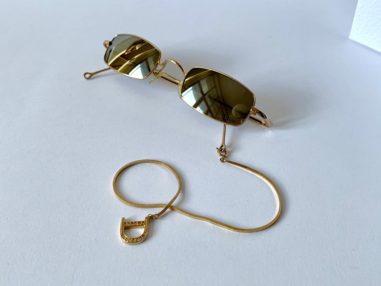Christian Dior Hanoi vintage sunglasses - golden mirrored lenses with Dior logo charm chain