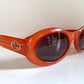 Gucci 90s vintage sunglasses - oval dark orange frame