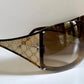 Gucci Vintage-Sonnenbrille aus den 90ern – brauner Wrap-Rahmen mit Strass-Horsebit-Logo