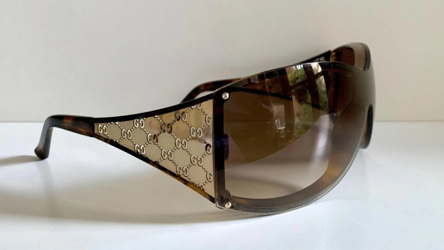 Gucci Vintage-Sonnenbrille aus den 90ern – brauner Wrap-Rahmen mit Strass-Horsebit-Logo