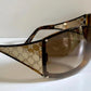 Gucci Vintage-Sonnenbrille aus den 90ern – brauner Wrap-Rahmen mit Strass-Horsebit-Logo
