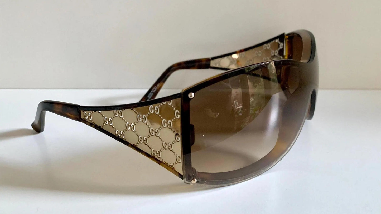 Gucci Vintage-Sonnenbrille aus den 90ern – brauner Wrap-Rahmen mit Strass-Horsebit-Logo