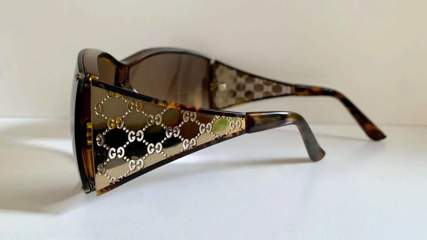 Gucci Vintage-Sonnenbrille aus den 90ern – brauner Wrap-Rahmen mit Strass-Horsebit-Logo