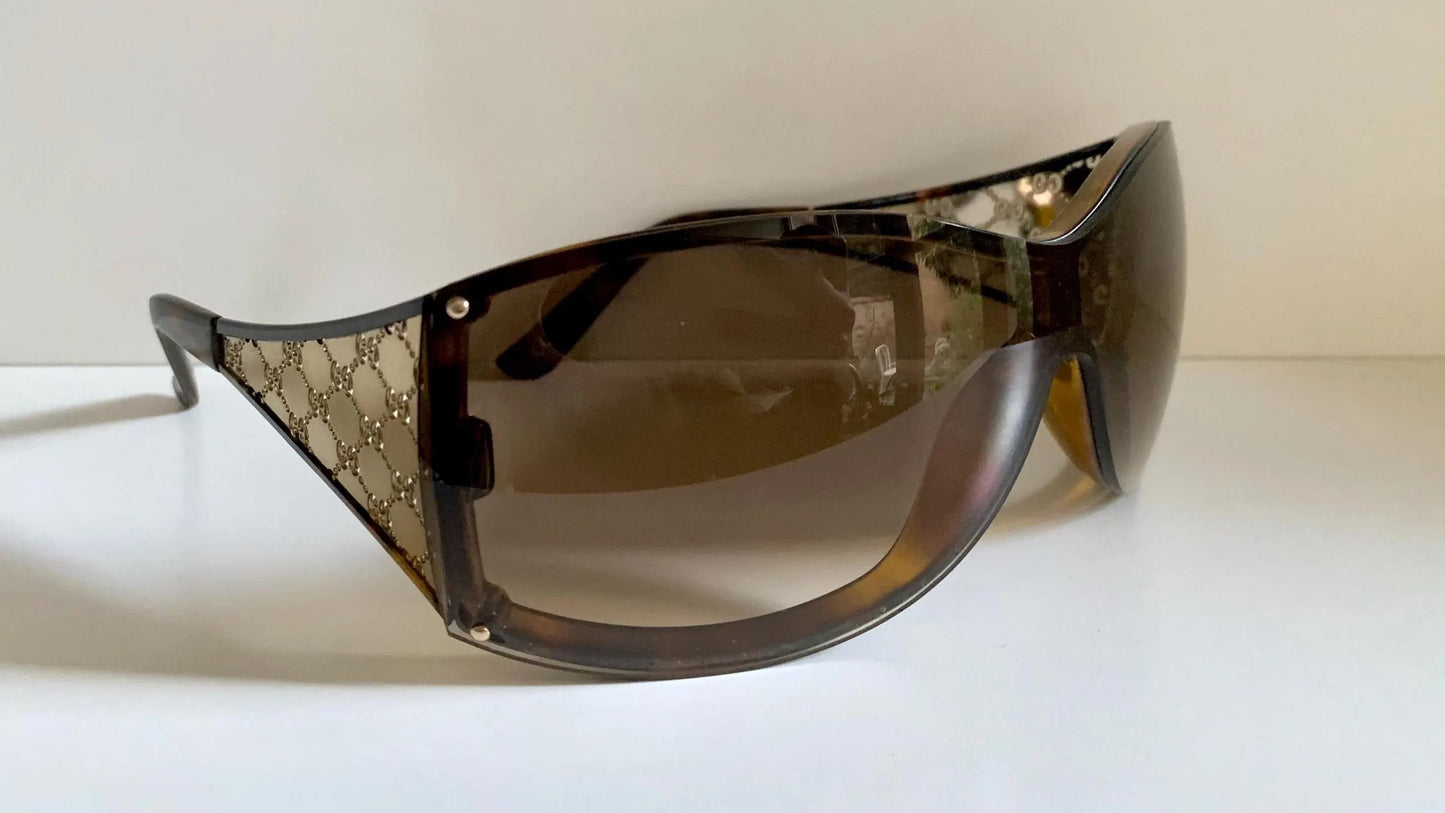 Gucci Vintage-Sonnenbrille aus den 90ern – brauner Wrap-Rahmen mit Strass-Horsebit-Logo