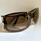 Gucci Vintage-Sonnenbrille aus den 90ern – brauner Wrap-Rahmen mit Strass-Horsebit-Logo