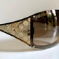 Gucci Vintage-Sonnenbrille aus den 90ern – brauner Wrap-Rahmen mit Strass-Horsebit-Logo