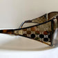 Gucci Vintage-Sonnenbrille aus den 90ern – brauner Wrap-Rahmen mit Strass-Horsebit-Logo